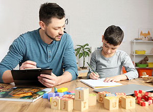 Psychologist providing psychoeducational assessment for child