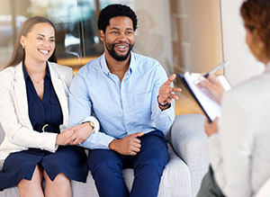 Parents having parent consultation with psychotherapist